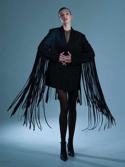 UPCYCLED JACKET WITH FRINGE with a man's shoulder