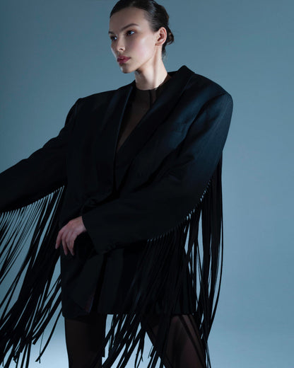 UPCYCLED JACKET WITH FRINGE with a man's shoulder