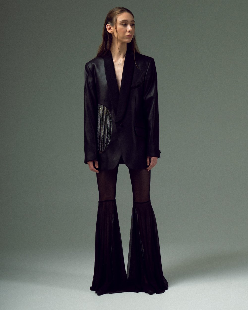 BEADED UPCYCLED JACKET with a man's shoulder