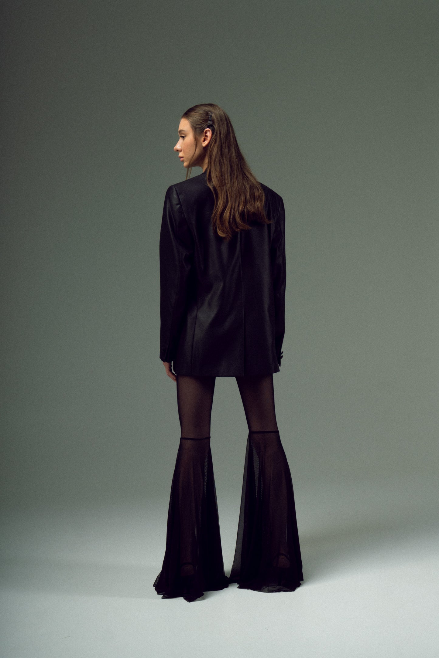 BEADED UPCYCLED JACKET with a man's shoulder